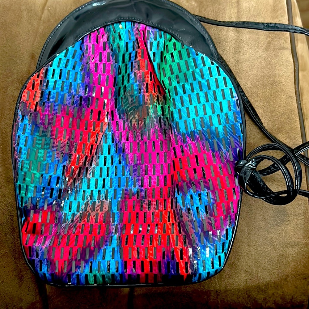 Multicolored bag with patent leather strap